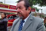 Padre de Ada Cuadros.