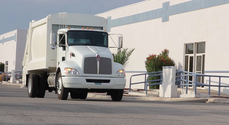 Firman contrato con consorcio Wan An-Romarc para compra de camiones compactadores de basura